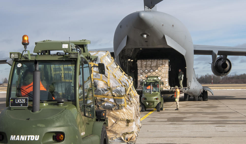 Lithuanian servicemen load Stinger anti-aircraft systems into military cargo plane at the Siauliai airbase on Feb. 12. The weapons were part of Lithuania's assistance to Ukraine. The Stingers have been used to bring down low-flying Russian planes and helicopters.