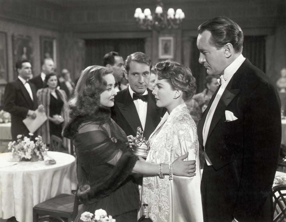 Bette Davis, Gary Merrill, Anne Baxter and George Sanders in <em>All About Eve. </em>
