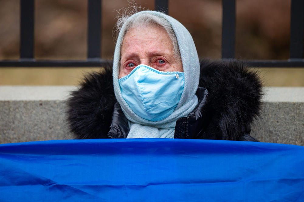 <strong>Feb. 24:</strong> Rita Shabisnakova's eyes well up with tears at a rally to support Ukraine at the Massachusetts State House. Shabisnakova says she fears for her friends and family still living in Ukraine.