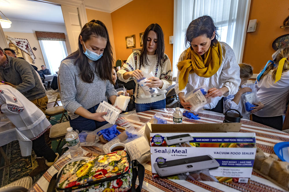 <strong>March 6:</strong> Renata Konrad and other volunteers from Plast, the Ukrainian Scout Organization, fill plastic bags with medical supplies that will be distributed to Ukrainians on the ground who need them at the Christ the King Ukrainian Catholic Church in Jamaica Plain, a neighborhood in Boston, Massachusetts.