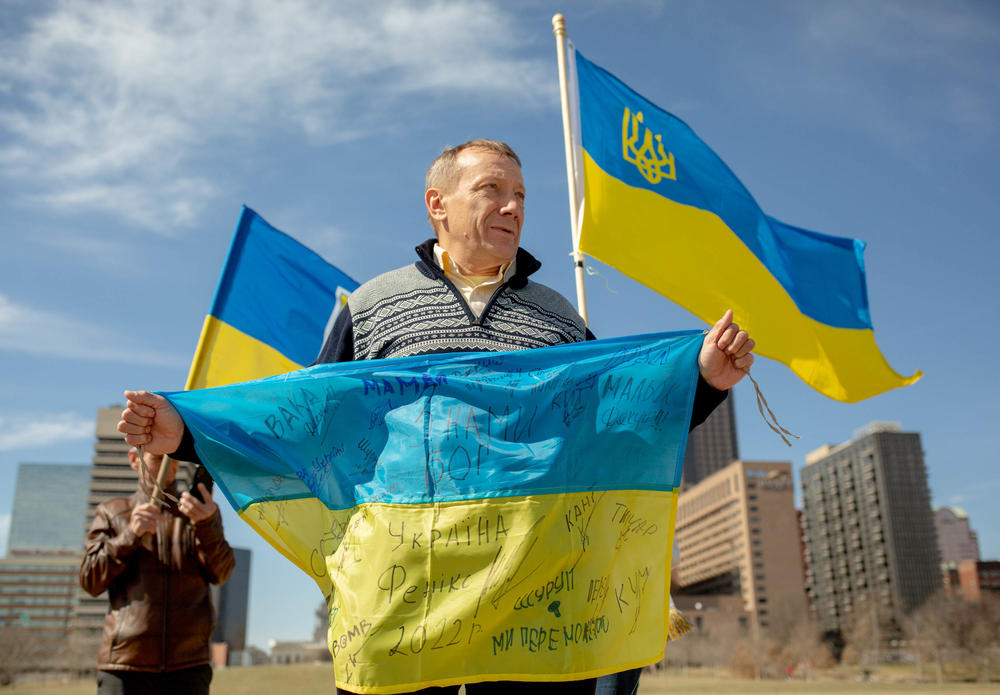 <strong>Feb. 28:</strong> Yuriy Safronov, 56, of Ballwin, Missouri, rallies under the Gateway Arch during a demonstration in St. Louis. Safronov returned to the United States after celebrating his mother's 80th birthday in Lviv.
