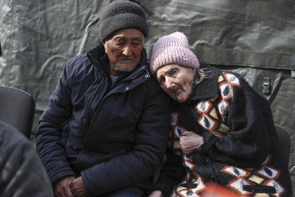 <strong>March 26:</strong> 69-year-old Boris Khijniak and his 75-year-old wife Galina are brought to a center near Ukrainian capital Kyiv's Irpin as evacuation of civilians from Ukraine's Irpin continue.