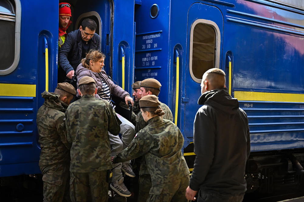 <strong>March 27</strong>: People, mainly women and children, arrive at Przemysl, Poland on a train from Odesa station after journeying from war-torn Ukraine.
