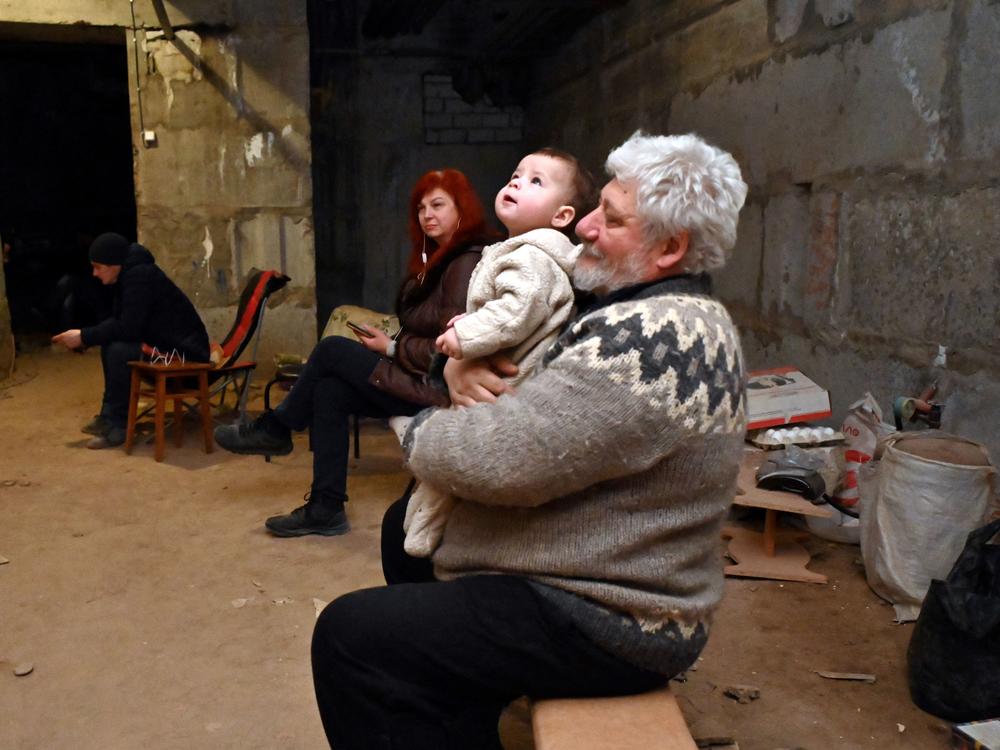 Ukrainians in the eastern city of Kharkiv take shelter in a basement on Sunday. The city, which is close to the Russian border, has been hard hit throughout the Russian invasion. Residents are bracing for a new Russian offensive in the eastern part of Ukraine.