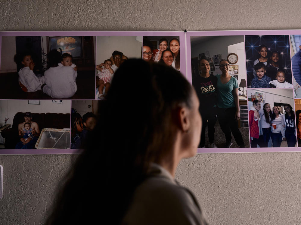 Allyssa Lewis looking at Memorial of her sister in her room in Richardson, Texas on April 4th, 2022.