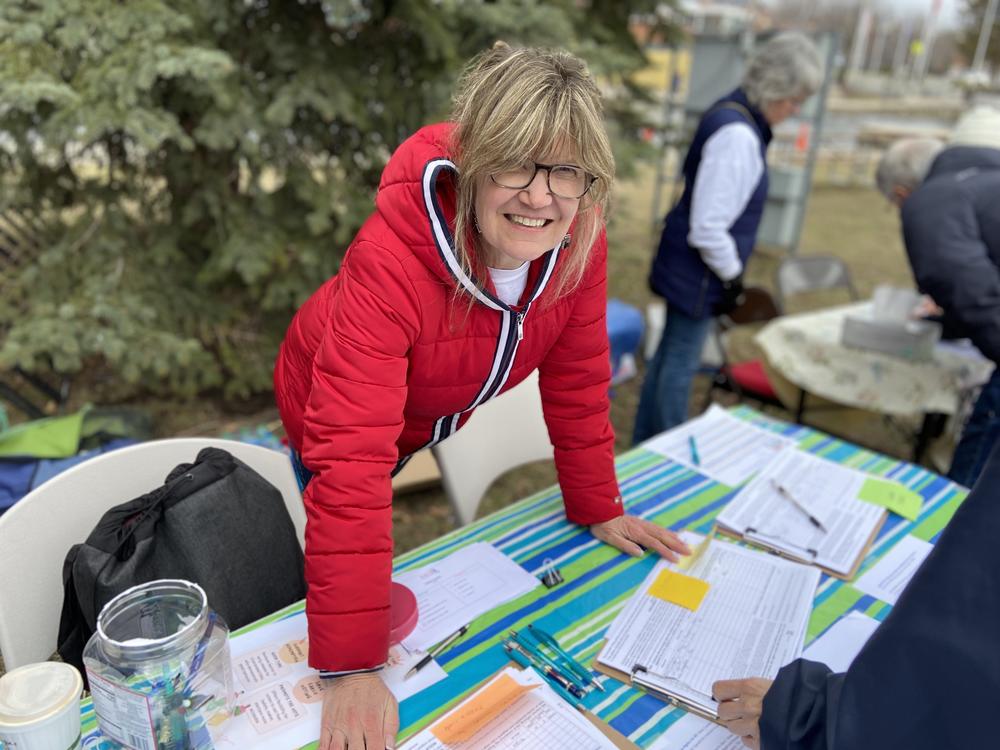 Brenda Lindsay, 58, is gathering signatures for a couple of statewide petitions on issues that include voting rights and raising the minimum wage. She helps run a local Indivsible chapter in Livingston County, Mich.