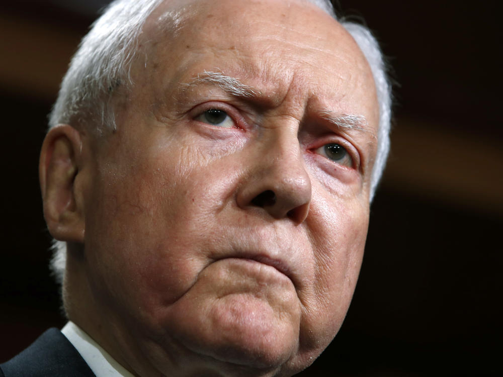 Then Sen. Orrin Hatch, R-Utah, is seen at a news conference with Republican members of the Senate Judiciary Committee on Capitol Hill in 2018. A longtime senator known for working across party lines, Hatch died Saturday at age 88.