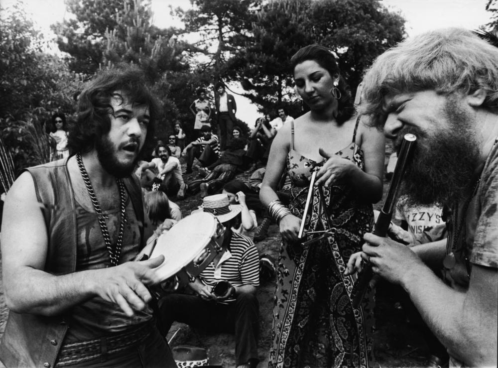 Flora Purim (center, on triangle) performs with her husband Airto Moreira (left, on tambourine) and Hermeto Pascoal at an outdoor concert in New York City in July 1970.