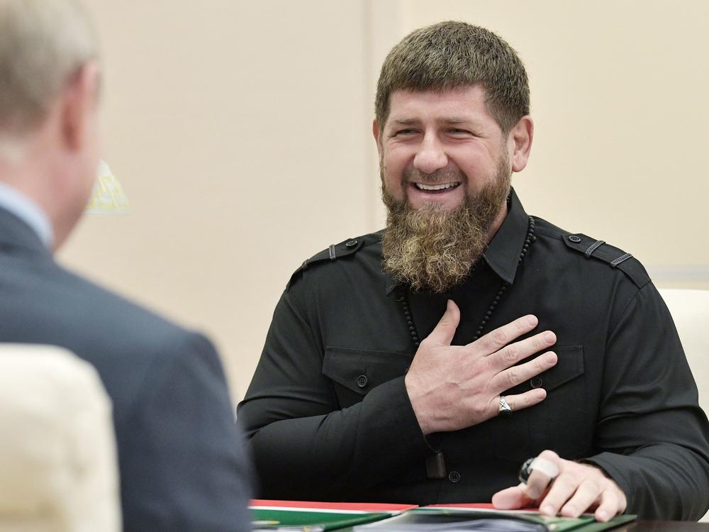 The head of the Chechen Republic, Ramzan Kadyrov, speaks with Russian President Vladimir Putinin 2019.