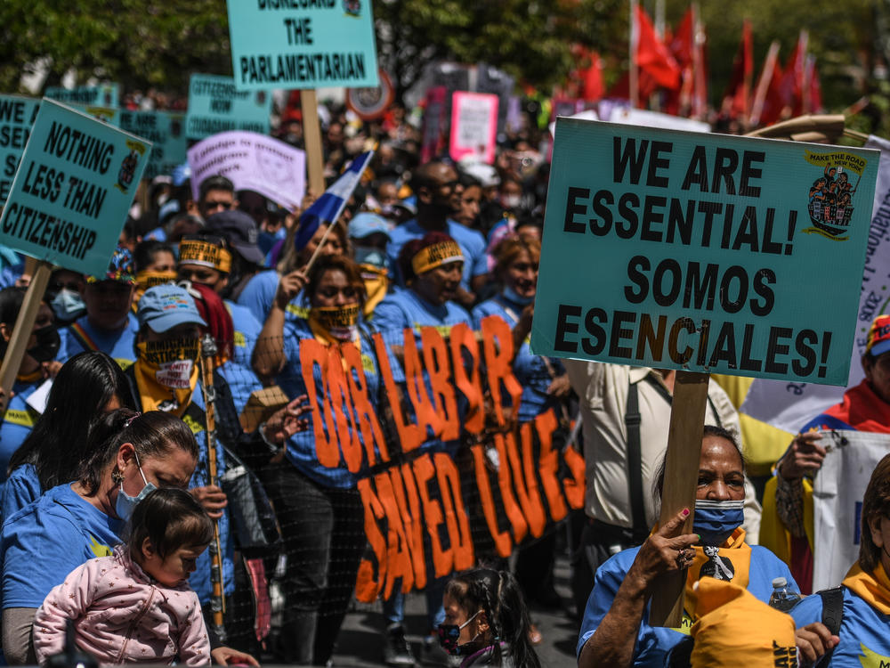 Workers participate in a May Day rally in New York City. Amazon workers recently unionized a facility in Staten Island, emboldening other workers to push for their companies to unionize.