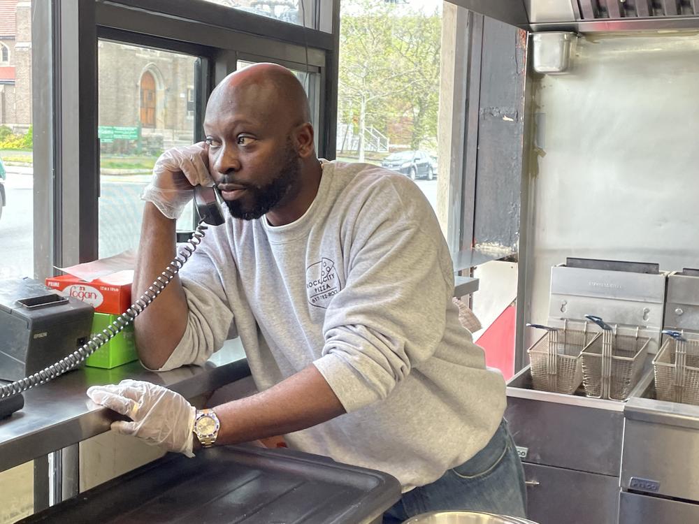 Joseph Charles, owner of Rock City Pizza in Boston, managed to survive the pandemic, only to find his place doing even worse now because of inflation.