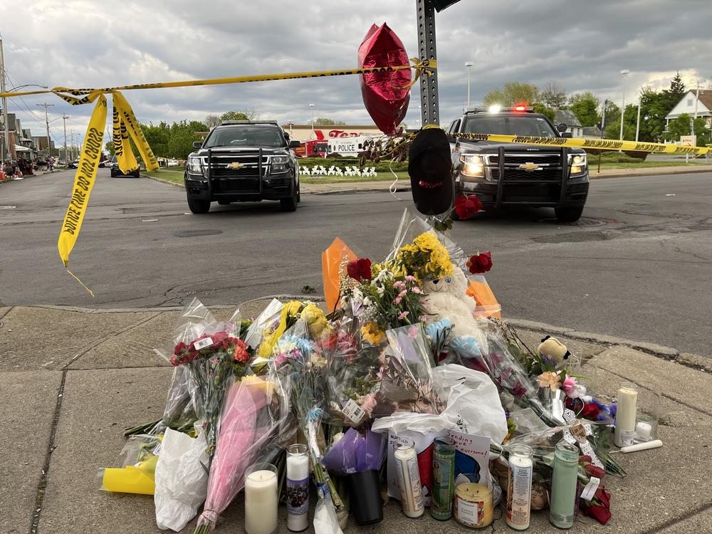 Flowers at a memorial at the scene of the shooting.
