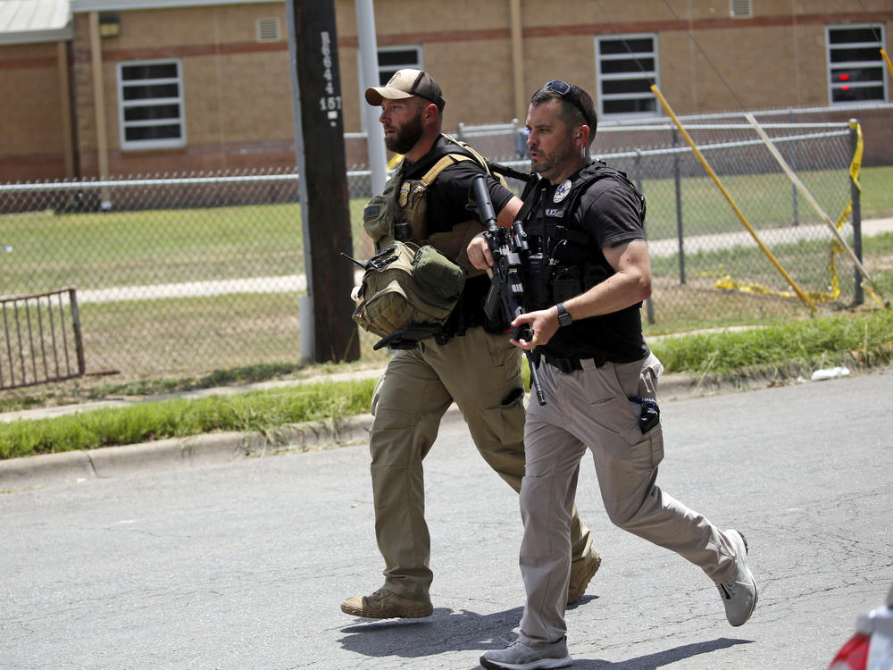Police respond to a shooting at Robb Elementary School in Uvalde, Texas, on Tuesday.