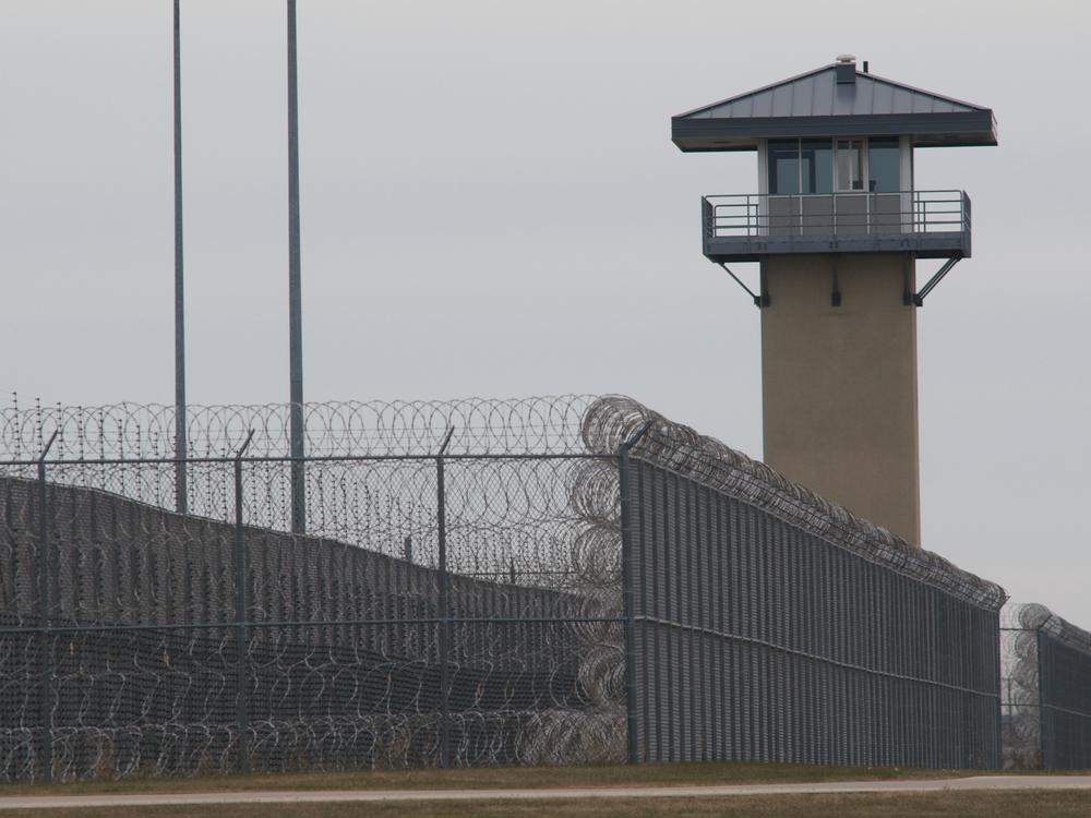A guard tower and prison yard at the Thomson Correctional Center in Thomson, Ill., in 2009. Five men have been killed at Thomson since 2019, making the facility one of the deadliest federal prisons in the country.