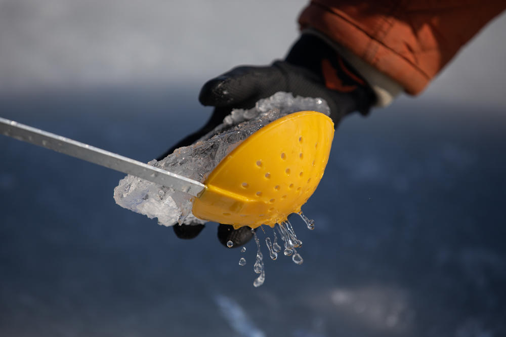 The Central Michigan University team uses an ice skimmer to collect ice from Lake Huron's Saginaw Bay on Feb. 15.