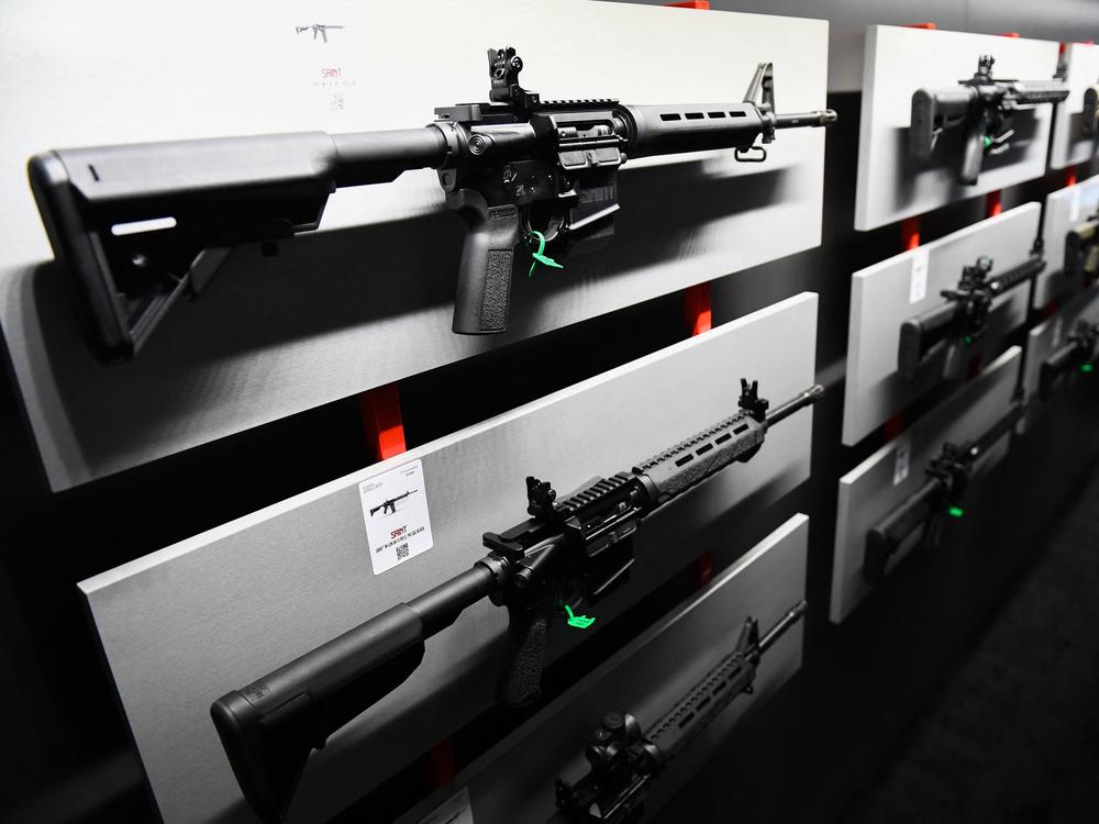A Springfield Armory SAINT M-LOCK AR-15 semi-automatic rifle is displayed on a wall of guns during the National Rifle Association (NRA) Annual Meeting at the George R. Brown Convention Center, in Houston, Texas on May 28, 2022.