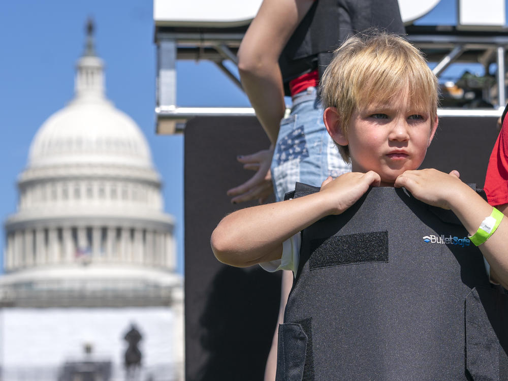Jacob Kelly, 6, adjusts his body armor while attending a rally against gun violence on June 6 outside the U.S. Capitol in Washington, D.C.