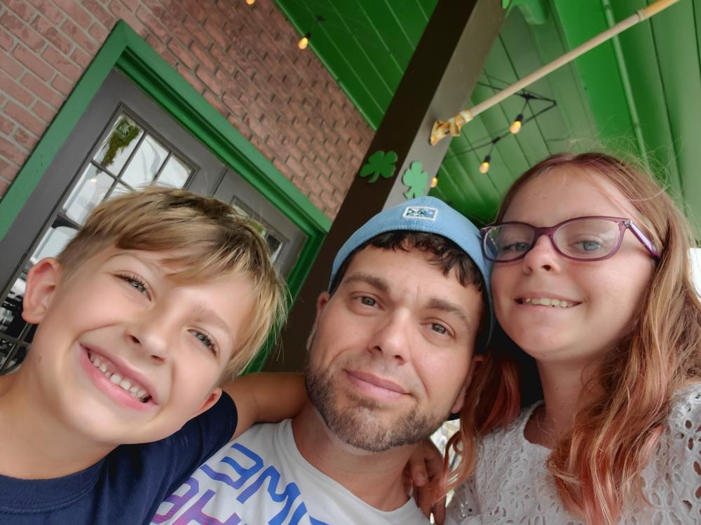 Brandon Schwedes of Port Orange, Fla., with his 11-year-old daughter and 8-year-old son. Schwedes had to move this year when the landlord dramatically raised the rent, then was outbid before finding another place he could afford.