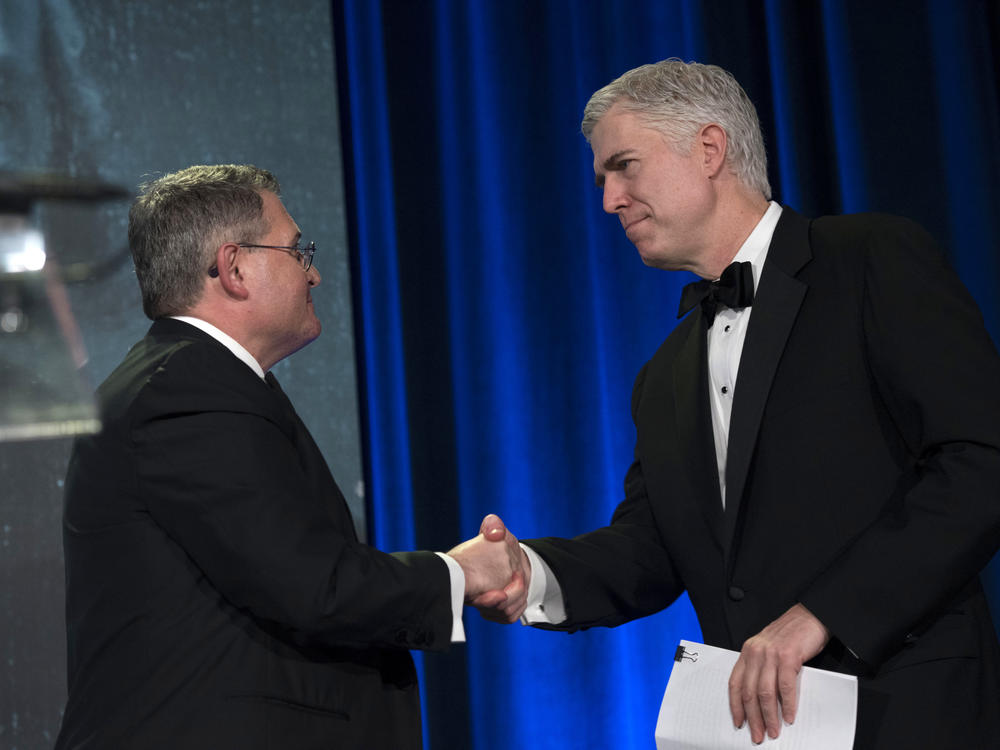 Leonard Leo welcomes Supreme Court Associate Justice Neil Gorsuch for a speech at the Federalist Society's 2017 National Lawyers Convention in 2017.