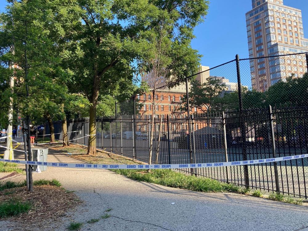 Crime scene tape surrounds the area on New York's Upper East Side, Thursday, June 30, 2022, where police say a 20-year-old woman was fatally shot Wednesday night while she pushed her infant in a stroller.