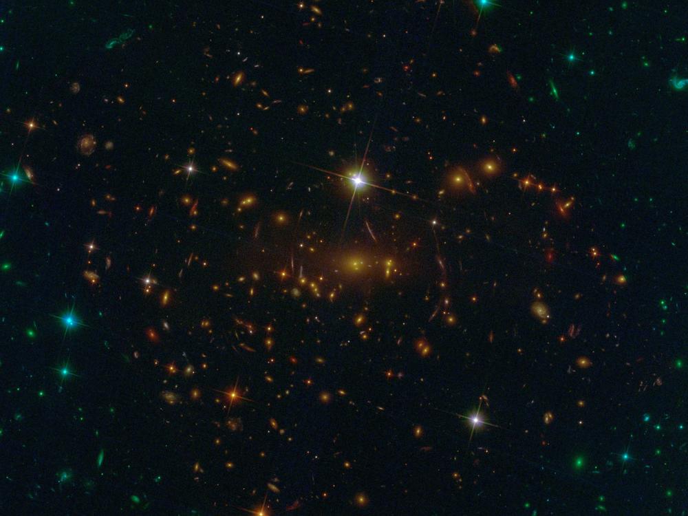One early target for the James Webb Space Telescope is a cluster of distant galaxies known as SMACS 0723. The gravitational field of these galaxies acts as a cosmic lens, allowing the telescope to look at far more distant and older parts of the universe.