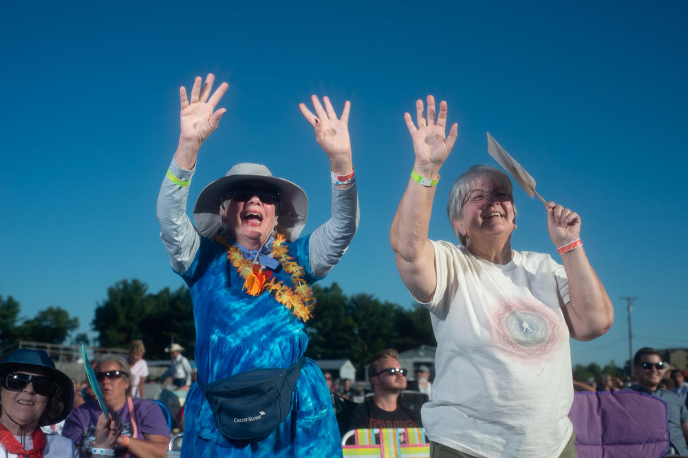 Two women react to a performance at the Michigan Elvisfest on Saturday, July 9.