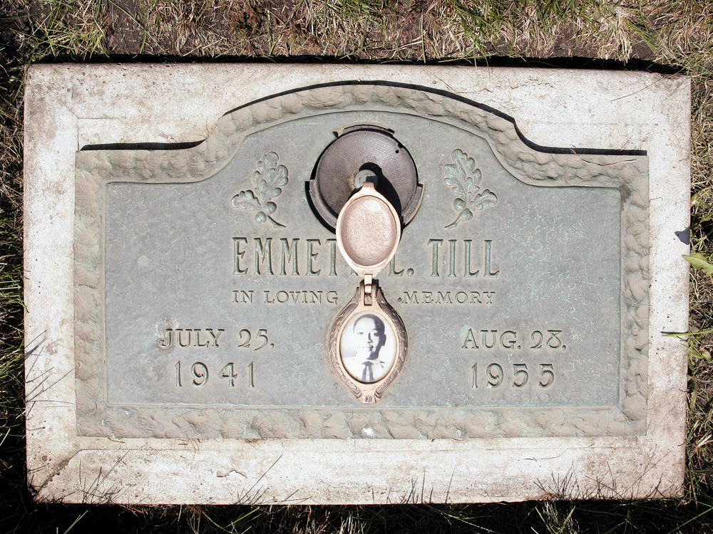 A plaque marks the gravesite of Emmett Till at Burr Oak Cemetery in Aslip, Illinois.