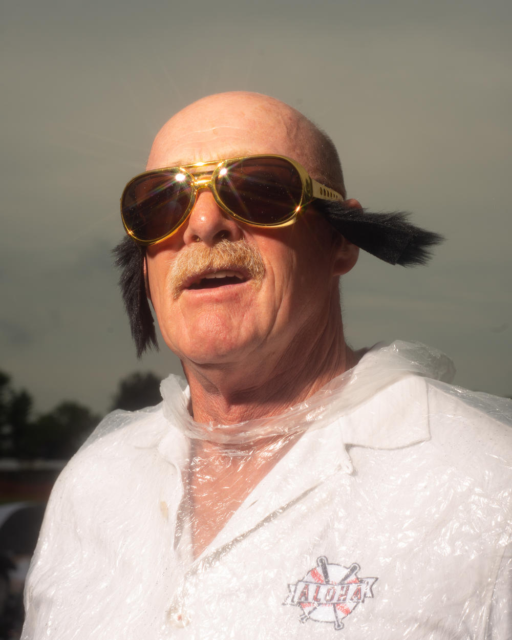 Tom Byrd of Dundee, Mich., poses at the Michigan Elvisfest on Friday, July 8.