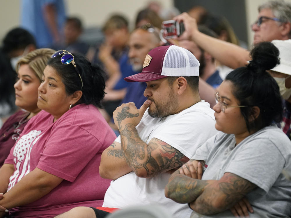 Family of shooting victims listen to the Texas House investigative committee release its full report on the shootings at Robb Elementary School, Sunday, July 17, 2022, in Uvalde, Texas.