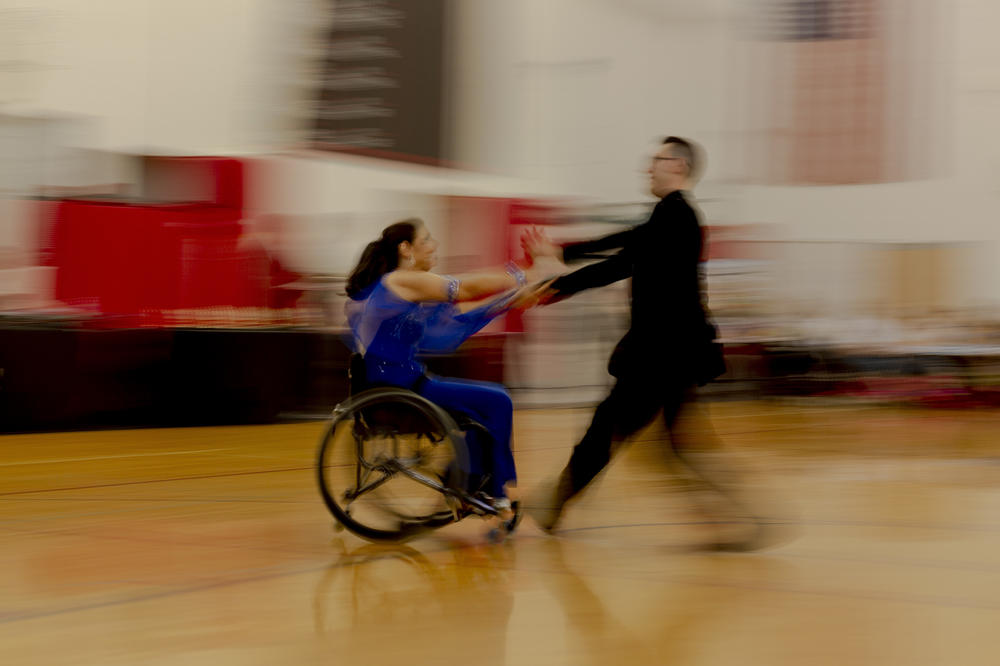 Paralympic medalist Cheryl Angelelli and founder of Dance Mobility's Adapted Ballroom Dance Competition dances with Tamerlan Gadirov<strong> </strong>in the competition.