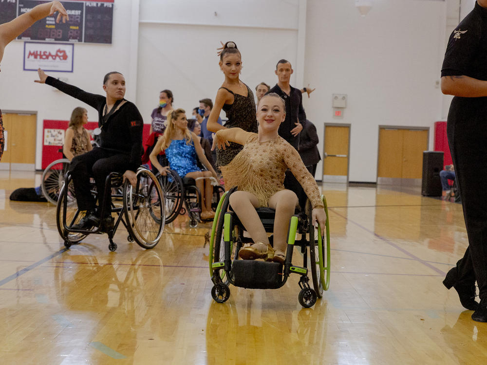Eve Dahl, 14, of Wisconsin after the Dance Mobility's Adapted Ballroom Dance Competition for persons with physical disabilities at the Roeper School, in Bloomfield Hills, Mich., on July 16.