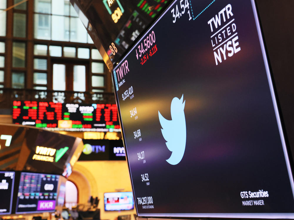 A Twitter logo is displayed on a screen at the New York Stock Exchange in early July.