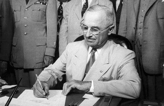 President Harry Truman signs the National Security Act on July 26, 1947. The measure created the CIA, the National Security Council and the military's Joint Chiefs of Staff.