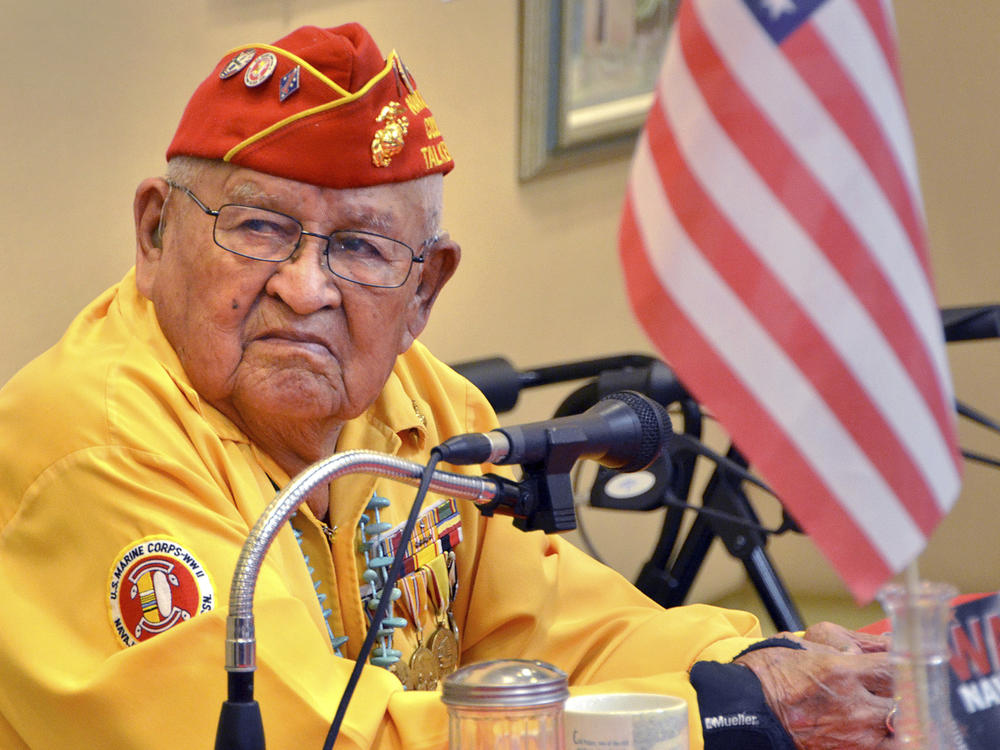 In this 2013 photo, Navajo Code Talker Samuel Sandoval talks about his experiences in the military. Sandoval, one of the last remaining Navajo Code Talkers who transmitted messages in World War II using a code based on their native language, has died at age 98.