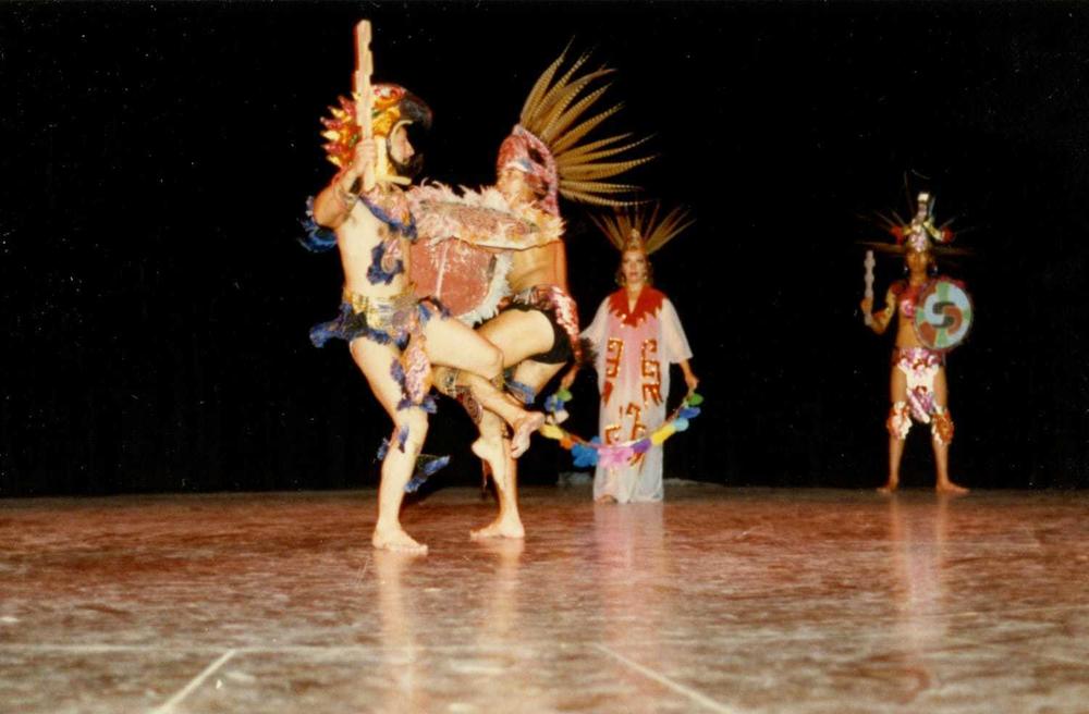 Tio Sergio (left) performs an Aztec dance in 1990.