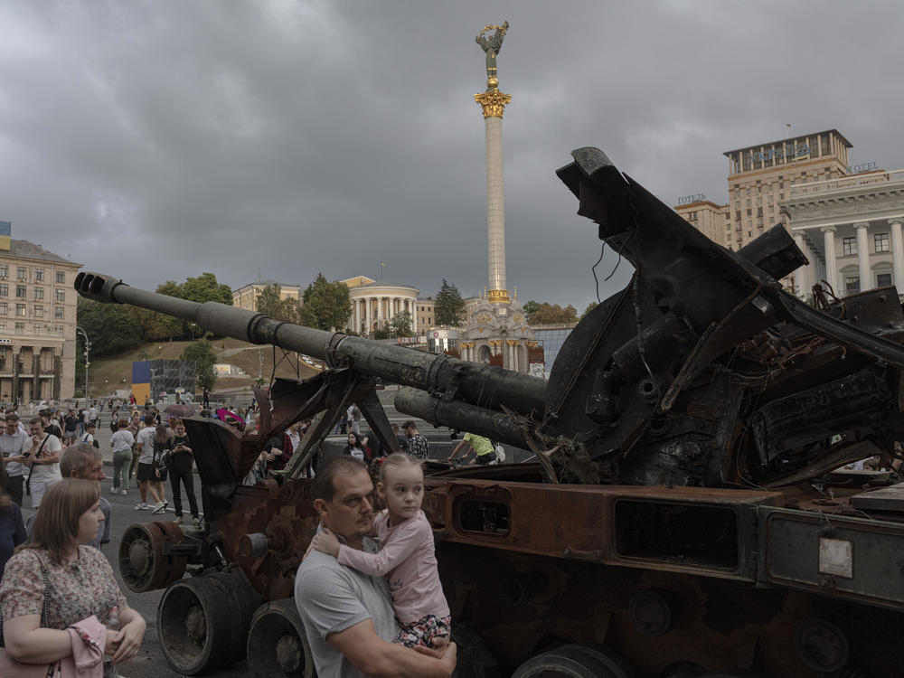 Ukrainians visit an avenue where destroyed Russian military hardware is displayed in Kyiv, Ukraine, on Saturday.