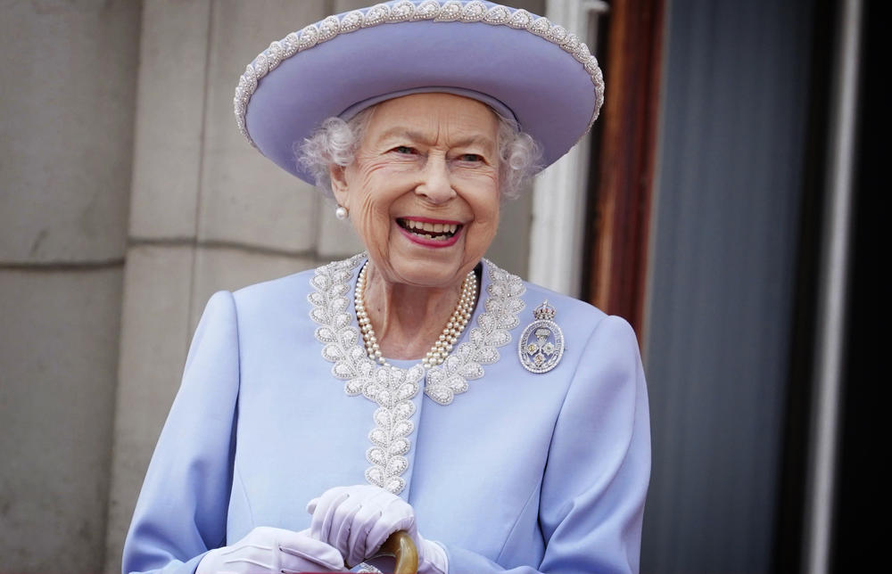 <strong>June 2, 2022</strong>: Queen Elizabeth II watches with a smile from the balcony of Buckingham Palace after the Trooping the Color ceremony in London on the first of four days of celebrations to mark the Platinum Jubilee.