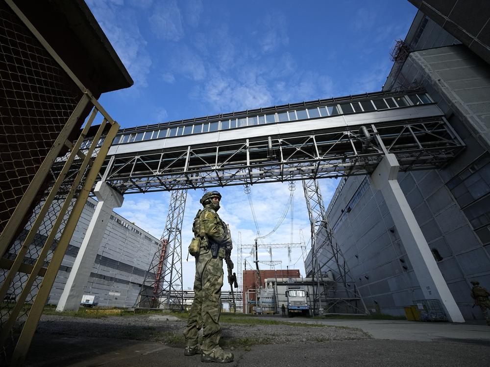 A Russian serviceman guards an area of the Zaporizhzhia nuclear power plant in May.
