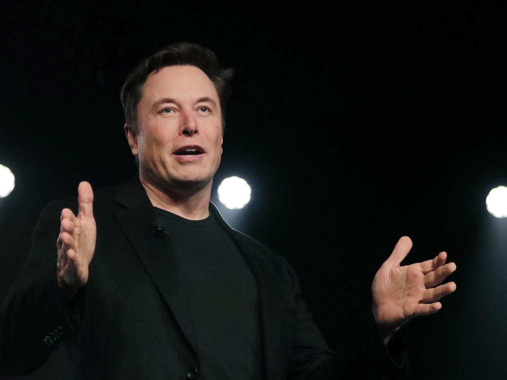 Tesla CEO Elon Musk speaks in March 2019 before unveiling the Model Y at Tesla's design studio in Hawthorne, Calif.. Musk's legal team is demanding to hear from a whistleblowing former Twitter executive who could help bolster Musk's case for backing out of a $44 billion deal to buy the social media company.
