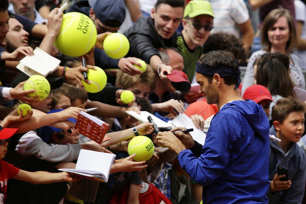 <strong>May 25, 2019:</strong> Roger Federer signing autographs for his fans in Suzanne Lenglen court during Roland Garros kids day in Paris, France.