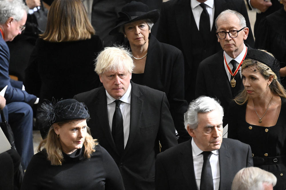Former Prime Minister of the United Kingdom Theresa May with her husband Philip May and former Prime Minister of the United Kingdom Boris Johnson with his wife Carrie Johnson and former Prime Minister of the United Kingdom Gordon Brown with his wife Sarah Jane Brown depart Westminster Abbey after the funeral service of Queen Elizabeth II on Monday.