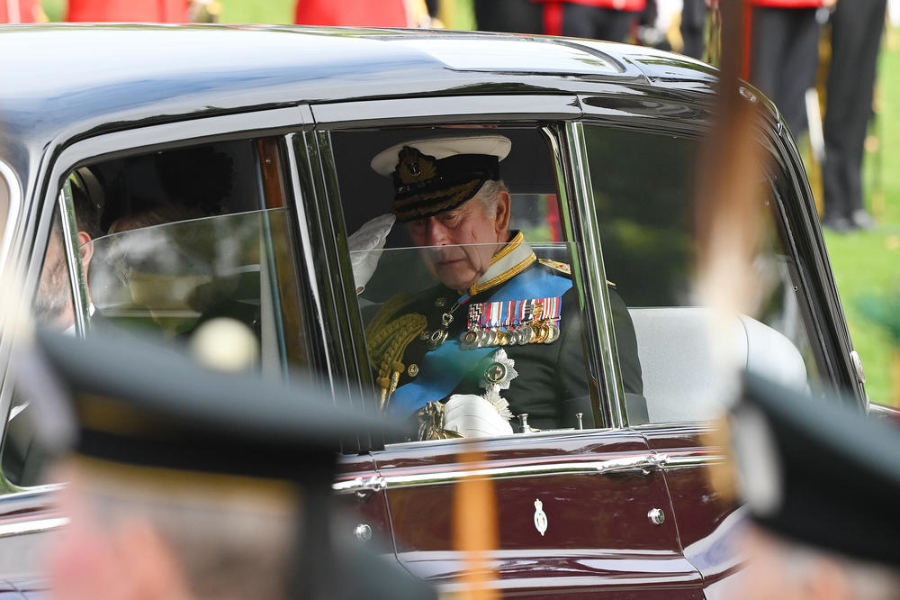 King Charles III drives past Wellington Arch during the State Funeral of Queen Elizabeth II on Monday.