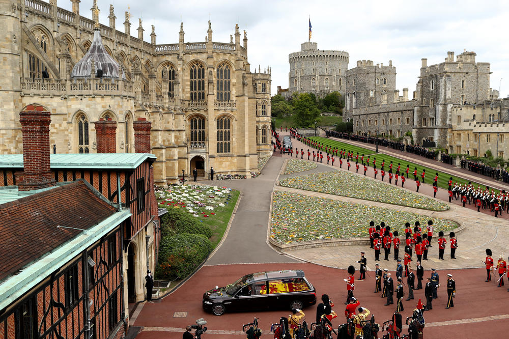 The Royal State Hearse carrying the coffin of Queen Elizabeth II arrives at Windsor Castle for the Committal Service on Monday. The committal service at St George's Chapel, Windsor Castle, took place following the state funeral at Westminster Abbey. A private burial in The King George VI Memorial Chapel followed.