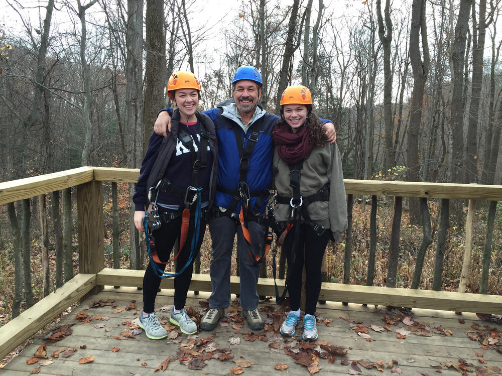 Ken with his daughters, Julia (left) and Kate, on a zip-lining adventure in Hocking Hills, Ohio, in 2015.
