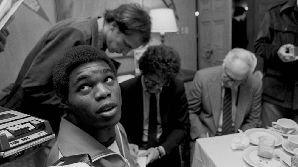Republican Senate nominee in Georgia Hershel Walker in an archival photo speaking to the press as a student at the University of Georgia