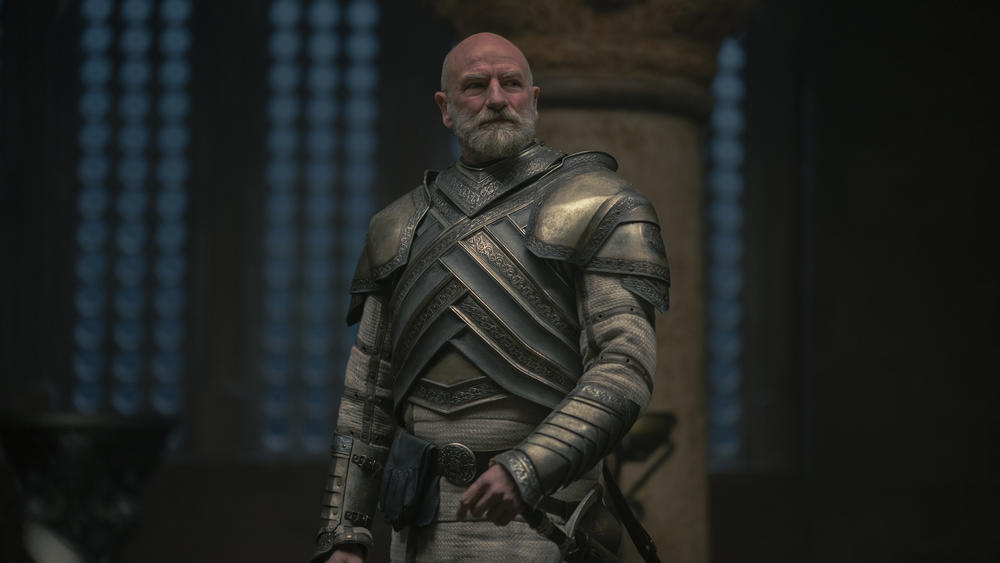 Lord Commander Harrold Westerling (Graham McTavish) glowers. And smolders, because I mean <em>look</em> at him. But mostly that first thing.
