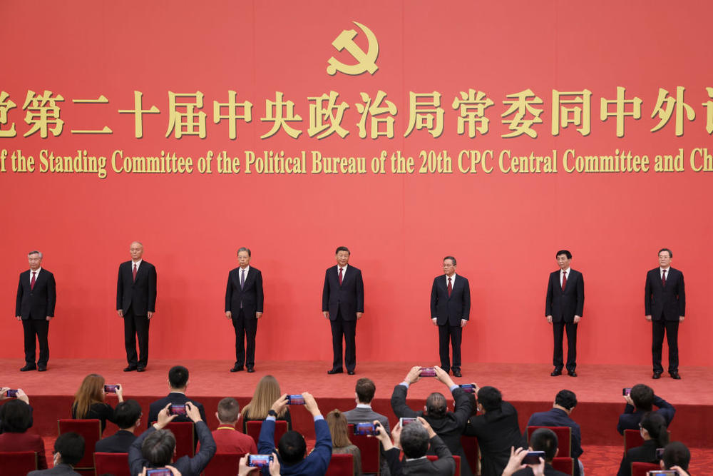 (Left to right )Li Xi, Cai Qi, Zhao Leji, Xi Jinping, Li Qiang, Wang Huning and Ding Xuexiang attend the meeting between members of the standing committee of the Political Bureau of the 20th CPC Central Committee and Chinese and foreign journalists in Beijing on Sunday. China's ruling Communist Party today revealed the new Politburo Standing Committee after its 20th congress.