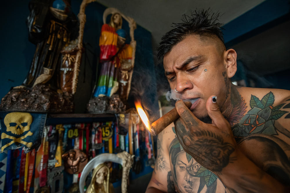 Paris, 33, is a Mexican wrestler. His faith in Santa Muerte began when he was able to overcome problems with alcohol and family thanks to his offerings and prayers to the Santa.