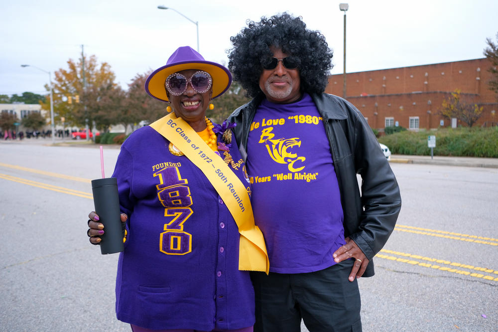 Mark Byrd of Charlotte, N.C., (right) and the Rev. Gillette Scott Ash, of Charleston, S.C., celebrate the class of 1972's 50th reunion during the Tigers' homecoming parade on Oct. 29, 2022.