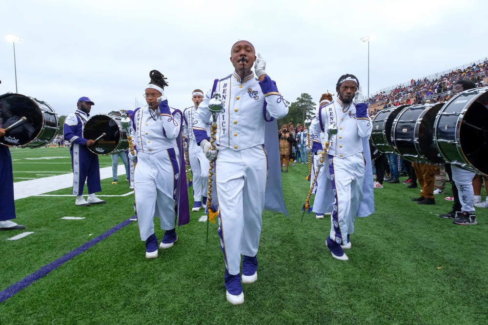 The Benedict College Marching Tigers Band of Distinction drum majors leave the field after a halftime performance during the school's homecoming game on Oct. 29, 2022.